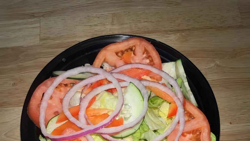 Garden Salad · Lettuce, tomato, cucumber, red onion, red bell pepper.

Choice of Italian, Ranch, or French Dressing