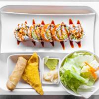 Shrimp Tempura Roll · Shrimp tempura, avocado, cucumber and Japanese mayo topped with masago and eel sauce.