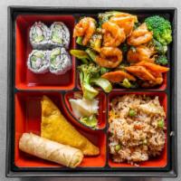 Broccoli With Shrimp Bento Box · Meat sautéed with broccoli and carrot in light brown sauce. Served with four pieces of Calif...