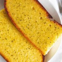 Garlic Bread (4 Pieces) · Bread, topped with garlic, herb seasoning, baked to perfection.