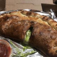 Veggie Calzone
 · Mushrooms, tomatoes, green peppers, onions, spinach, and broccoli.