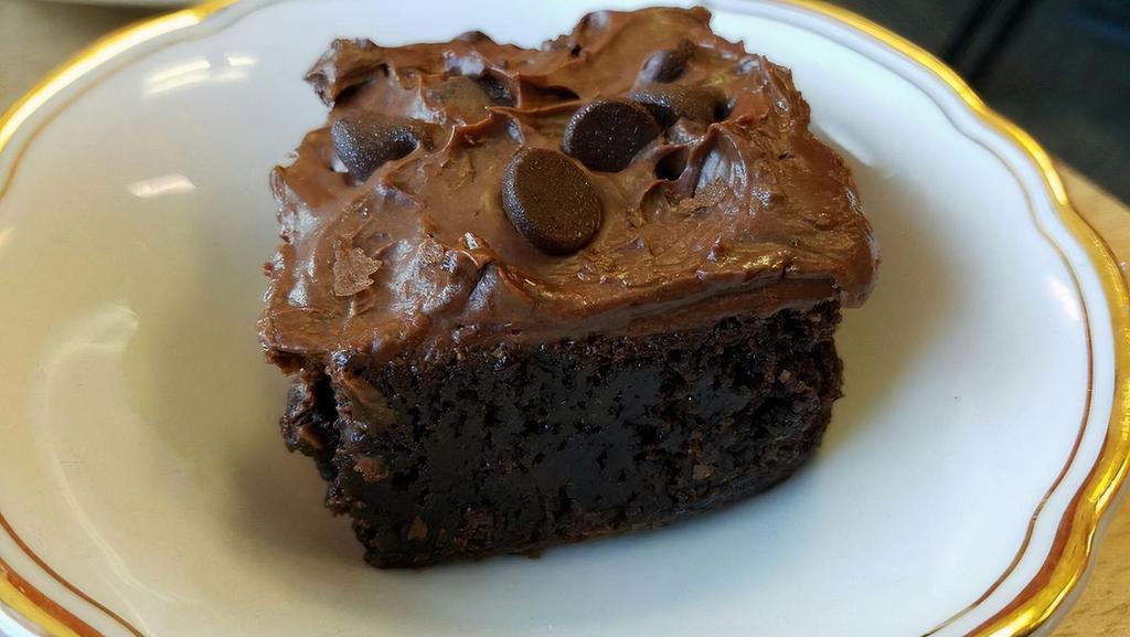 Brownie · Decadent chocolate brownie topped with chocolate frosting.