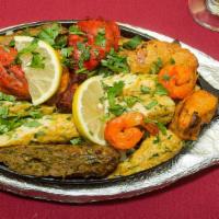 #56. Aladdin Platter (Mix Grill) · Combination of tikka, tandoori chicken, shish kabab, lamb tikka and shrimp.