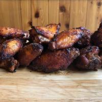 Wings (18) · 18 traditional-style, smoked chicken wings flash fried to order, then dusted in our signatur...