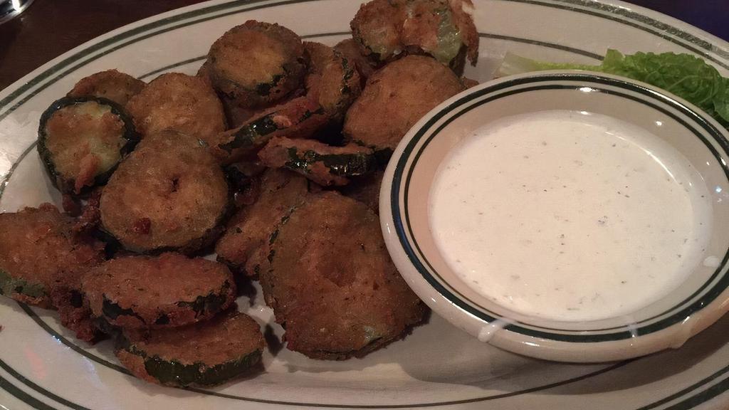 Fried Pickles · Beer battered, coated in Italian breadcrumbs & served with house made ranch dressing.
