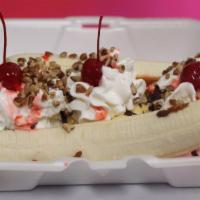 Banana Split · 3 scoops of ice cream of your choice with whip cream, cherries, sprinkles and hot chocolate