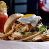 Train Wreck Burger · Sunny-side up egg, Hand-Cut Fries, caramelized onions, sautéed mushrooms, cheddar, lettuce, ...