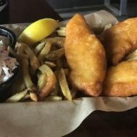 Fish & Chips · Three hand-crafted fillets of Atlantic Haddock served with Hand-Cut Fries along with colesla...