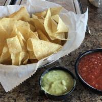 Trio Dip · Beans, cheese dip, and salsa. Served with fresh tortilla chips.