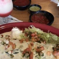 Shrimp Enchiladas · Signature dish. Three cheese enchiladas topped with melted cheese, pico de gallo, and our sp...