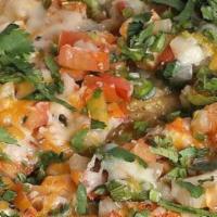 Classic Nachos | Usa · Strips of grilled chicken black beans, melted cheese, jalapeños, pico de gallo, and cilantro...