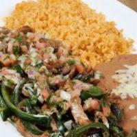 Gordo Special | Mexico · Tender strips of grilled steak cooked with roasted poblano peppers and topped with fresh pic...