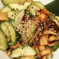 Spicy Squid Salad · Spicy. Cucumber, mushroom, spicy sesame ginger dressing.