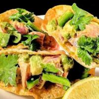 Tuna Wonton Tacos · Raw. Seared tuna, avocado, spicy wasabi aioli, cilantro.