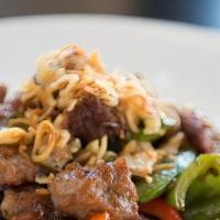 Hong Kong Steak /Rice · Spicy. Cubed steak, bell peppers, sugar snap peas, onion in Chef’s special sauce.