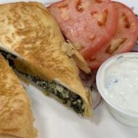 Spanakopita · Includes salad and choice of side.