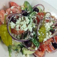 Greek Salad · Romaine, tomatoes, cucumbers, red onion, imported feta, olives, pepperoncini and house dress...