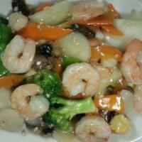 Harr Kow · Served with egg roll and chicken fried rice or white rice.
