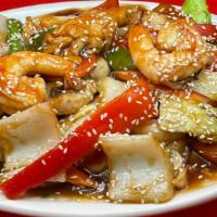 Double Sesame Delight · Hot & spicy dish. Sliced chicken, jumbo shrimp w. water chestnuts, bamboo shoots, snow peas,...