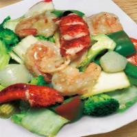 Seafood Delight · jumbo shrimp, scallops crabmeat with vegetables.