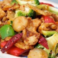 Szechuan Delight · Shredded beef, shrimp, chicken with mixed vegetables in Szechuan sauce. Hot and spicy.