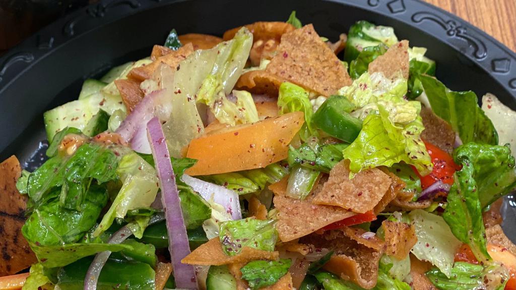 Fattoush · Lettuce, Tomato, Cucumber, Red Cabbage, Parsley, Pita Chips and Fattoush Dressing (9