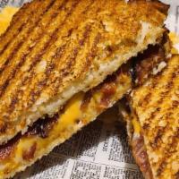 Grilled Cheese · American and provolone cheese. Served with a pickle and chips on bread. Substitute chips for...