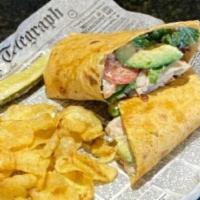 Turkey Club Wrap · Turkey, bacon, homemade guacamole, lettuce, tomato, Dijon, mayo. Served with a pickle and ch...