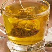 Tropical Green Tea · Our Special-Teas.  Green tea, strawberry, orange tangerine, pineapple.