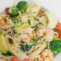 Shrimp Fettuccine · Fresh broccoli, cauliflower, zucchini, carrots and sun-dried tomatoes tossed with whole shri...