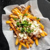 Fire Fries  · Crispy fries topped with our house orange sauce, feta cheese and fresh cilantro.
