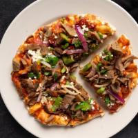 Flatbread Pizzas · Feta cheese, onions, diced tomatoes, banana peppers and our house sauce made with ripe tomat...