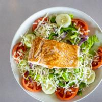 Salmon Salad · Grilled salmon with romaine lettuce, Jack cheese, green pepper, red onions, tomatoes and cuc...