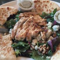 Michigan Salad · Spring mix, dried cherries, bleu cheese, onion, walnuts and grilled chicken. Served with ras...