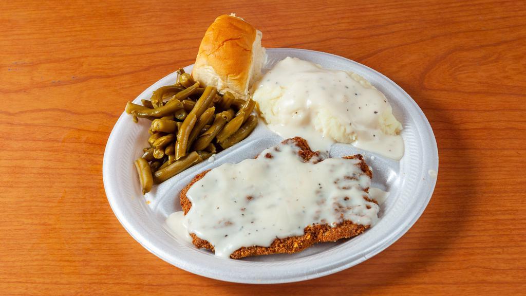 Chicken Fried Steak · Served with mashed potatoes, green beans or corn and a roll.