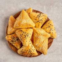 Beef / Turkey Samosas (2 Pieces) · Ground beef or turkey seasoned with authentic herbs and fried in a flour tortilla.
