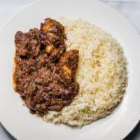 Liberian Kidney Beans · Kidney beans sautéed in a blend of onions, stew tomatoes, and herbs. Cooked with smoked turk...