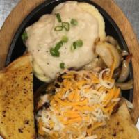 Southwest Chicken Skillet · Grilled chicken breast smothered in cheddar and monterey jack cheese, green and red peppers ...