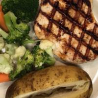Side Pockets Grilled Chicken · A healthy protein based option! A grilled chicken breast, served with steamed vegetables and...