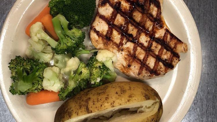 Side Pockets Grilled Chicken · A healthy protein based option! A grilled chicken breast, served with steamed vegetables and rice.