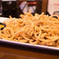 Onion Stack · A hearty plate of Mason's made onion straws served with Mason's bistro sauce.