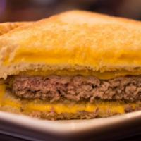 Grilled Cheese Cheeseburg · Mason's made 1/2 lb patty between two whole cheddar cheese grilled cheese sandwiches
