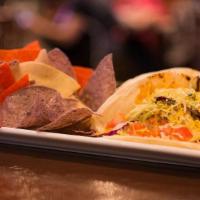 Fish Tacos · Three Mason's tacos with grilled and seasoned North Atlantic cod, topped with broccoli slaw,...