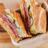 Pastrami · House smoked pastrami, pickles, Muenster and secret sauce!
