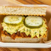 Pulled Pork · Contains dairy. Smoked pulled pork, smashville BBQ's famous slaw, pickles, house focaccia.