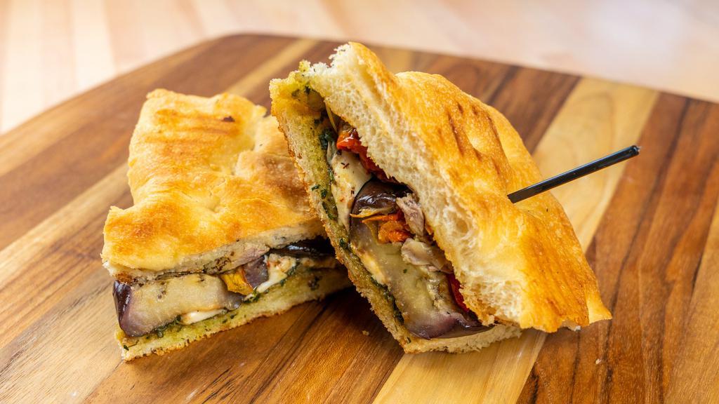 El Classico · Vegetarian. Contains nuts, dairy. Fresh mozzarella, roasted tomatoes, grilled artichokes, roasted eggplant, pesto, house focaccia. Made fresh daily no modifications.