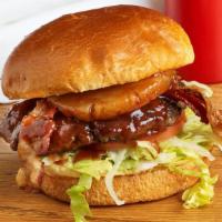 Jack Sparrow · Burger topped with grilled pineapple, bacon, lettuce, onion and twisted bbq sauce.