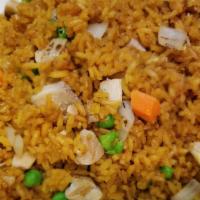 Chicken Fried Rice · Includes peas, carrots, onion, and eggs.