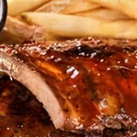 Baby Back Rib Platter (Half) · Our famous ribs are rubbed with our secret 
