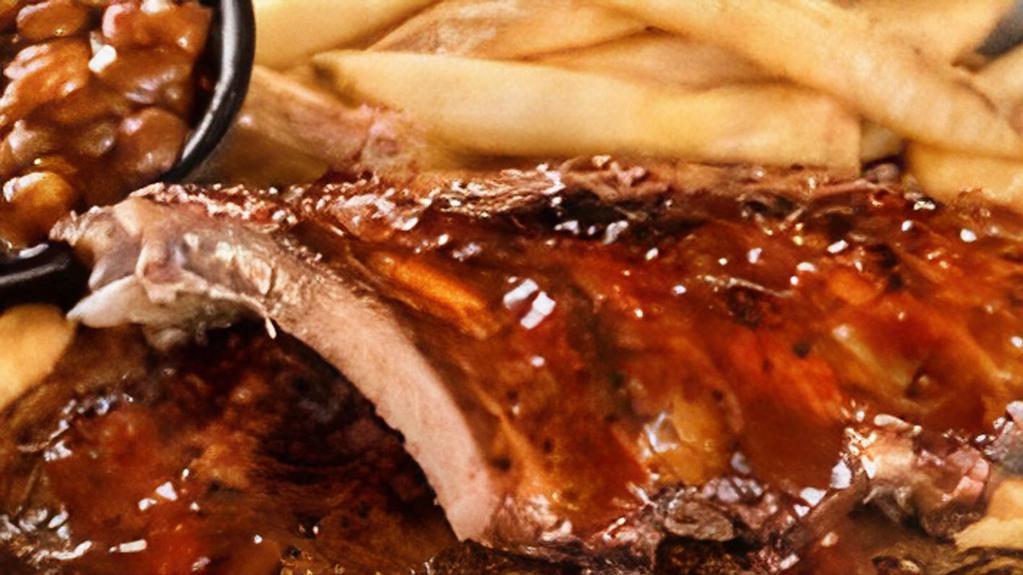 Baby Back Rib Platter (Half) · Our famous ribs are rubbed with our secret 